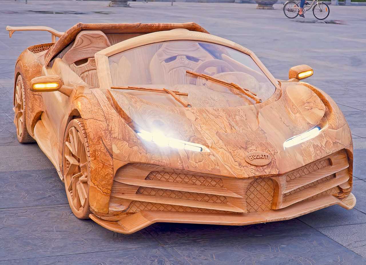 Artist Masterfully Crafts a Miniature Bugatti Centodieci Entirely from Wood  – TechEBlog